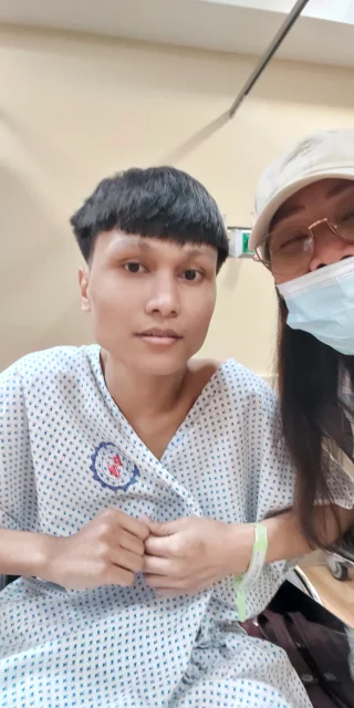 A JOLM member visiting a patient in hospital